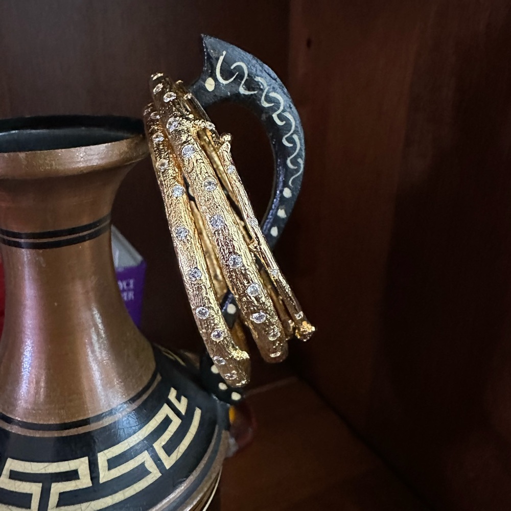 Gold plated bracelets (4) with rhinestones; does not tarnish; never worn